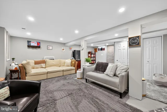 a living room with furniture and a couch