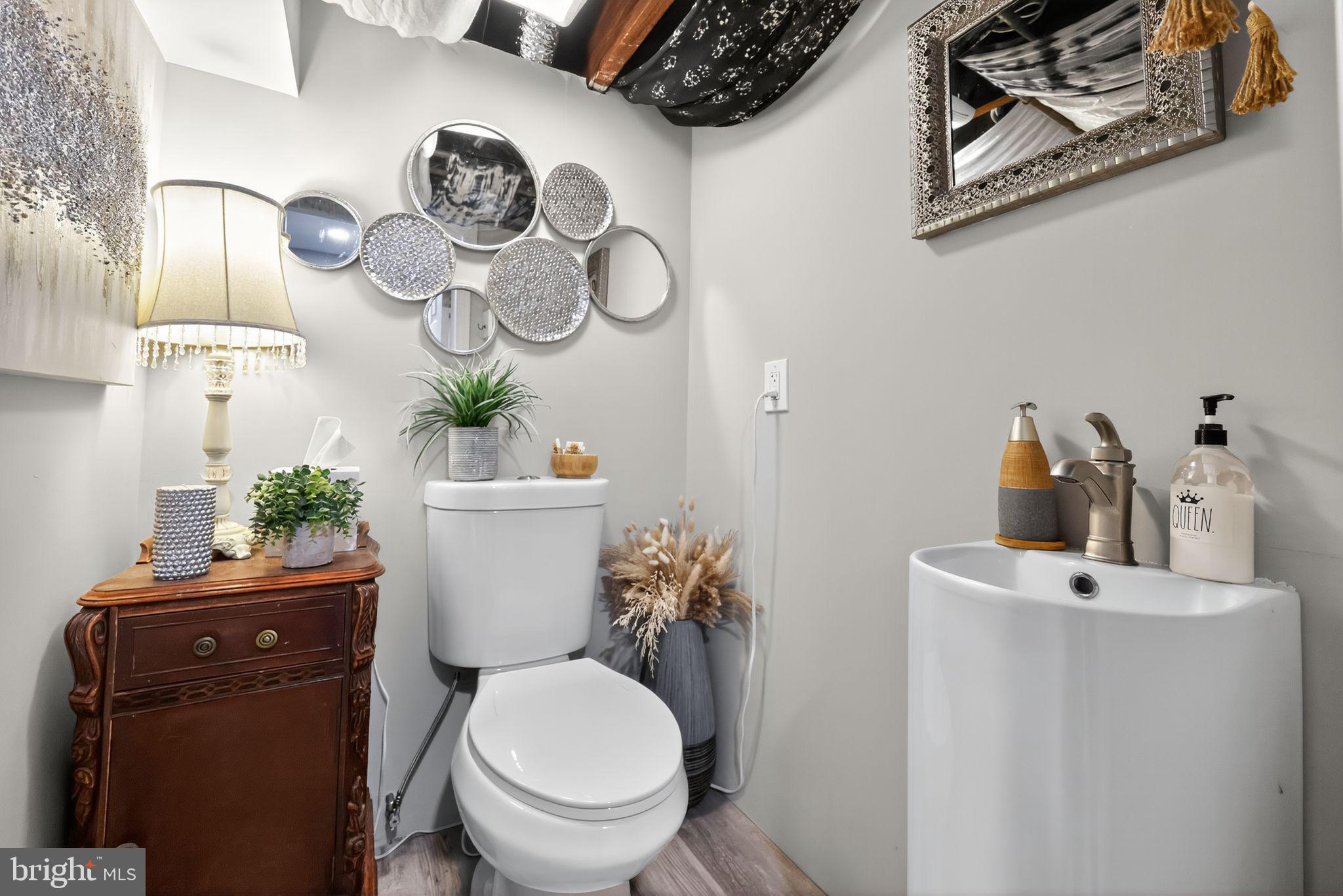 514 Park Avenue Laurel Springs, NJ 08021 - Photo 26 of 30 a bathroom with a toilet and a sink
