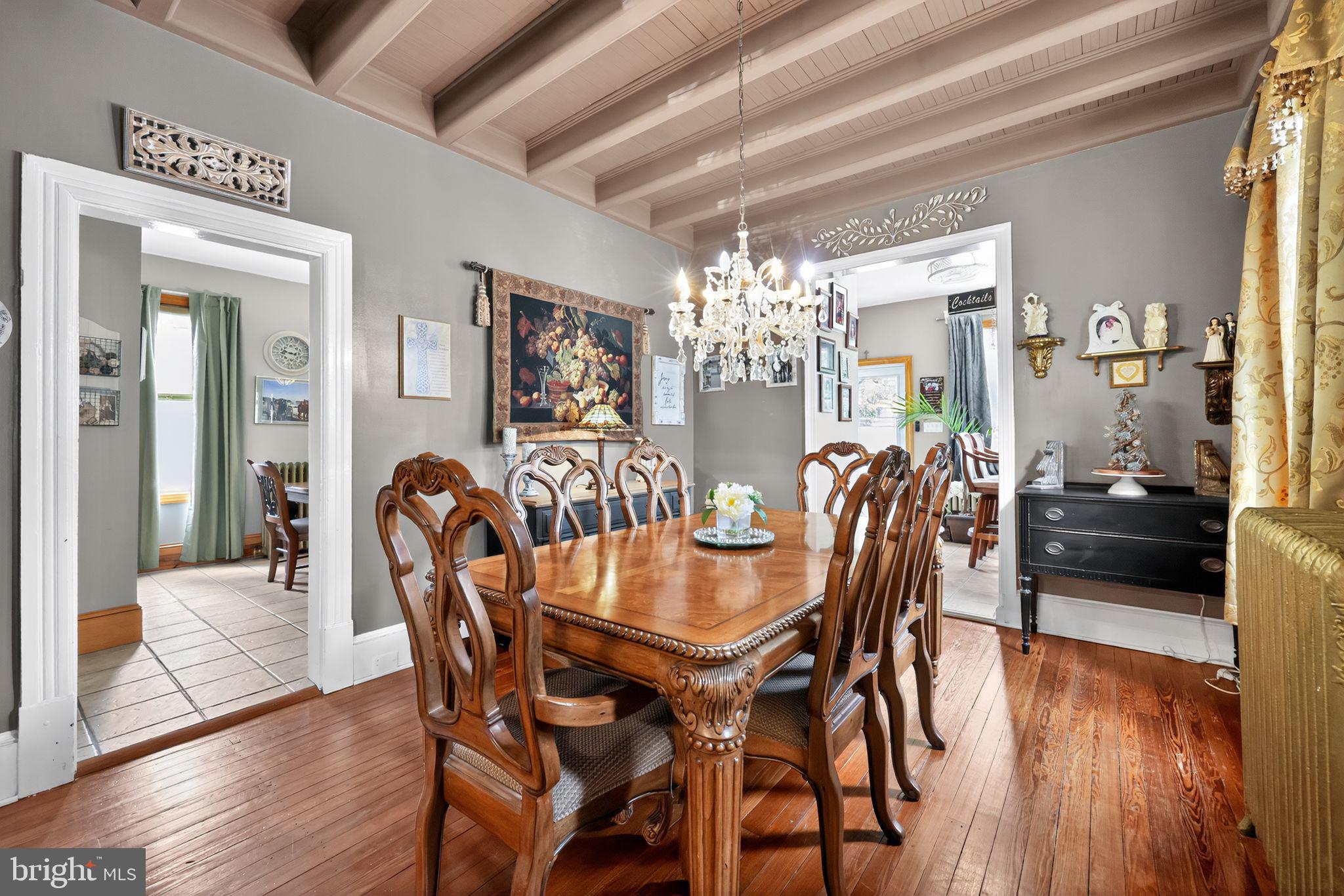 514 Park Avenue Laurel Springs, NJ 08021 - Photo 7 of 30 a view of a dining room with furniture and wooden floor