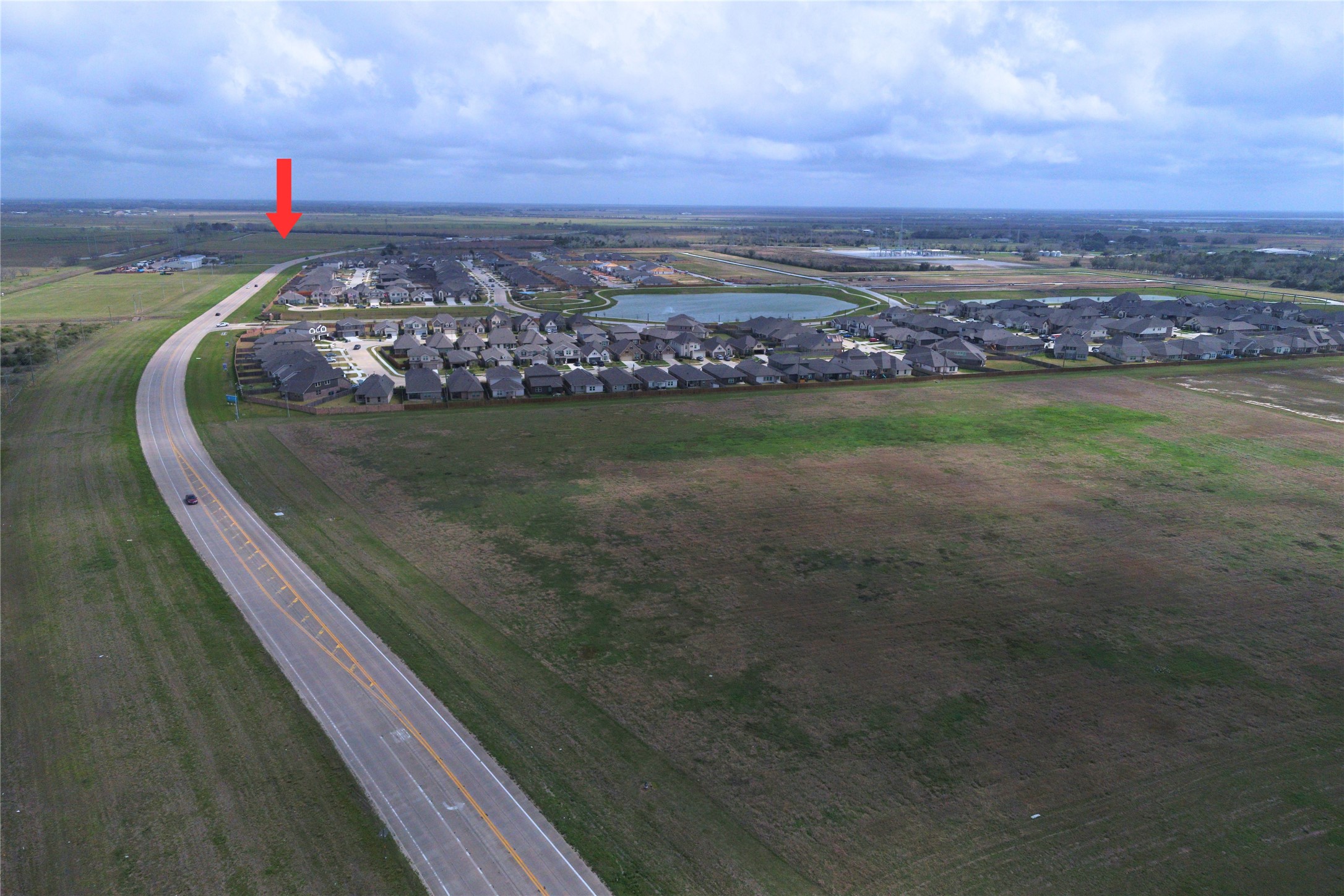 0 Fm 523 North Loop Angleton, TX 77515 - Photo 10 of 11 a view of a lake with a city