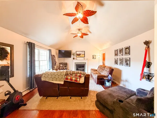 a bathroom with a sink mirror and a bathtub