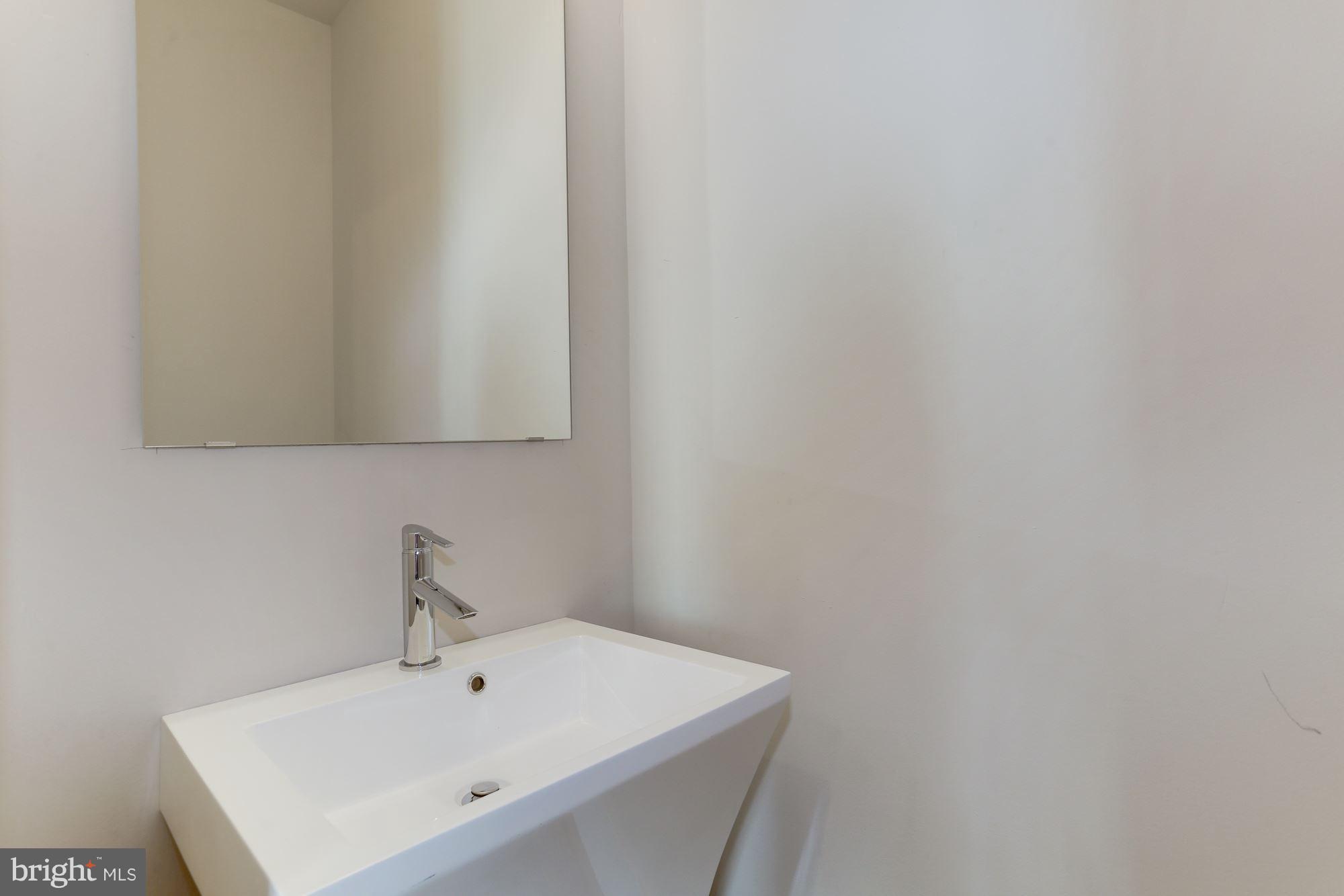 411 Ridge Street Northwest, Unit 1 Washington, DC 20001 - Photo 8 of 19 Half Bath