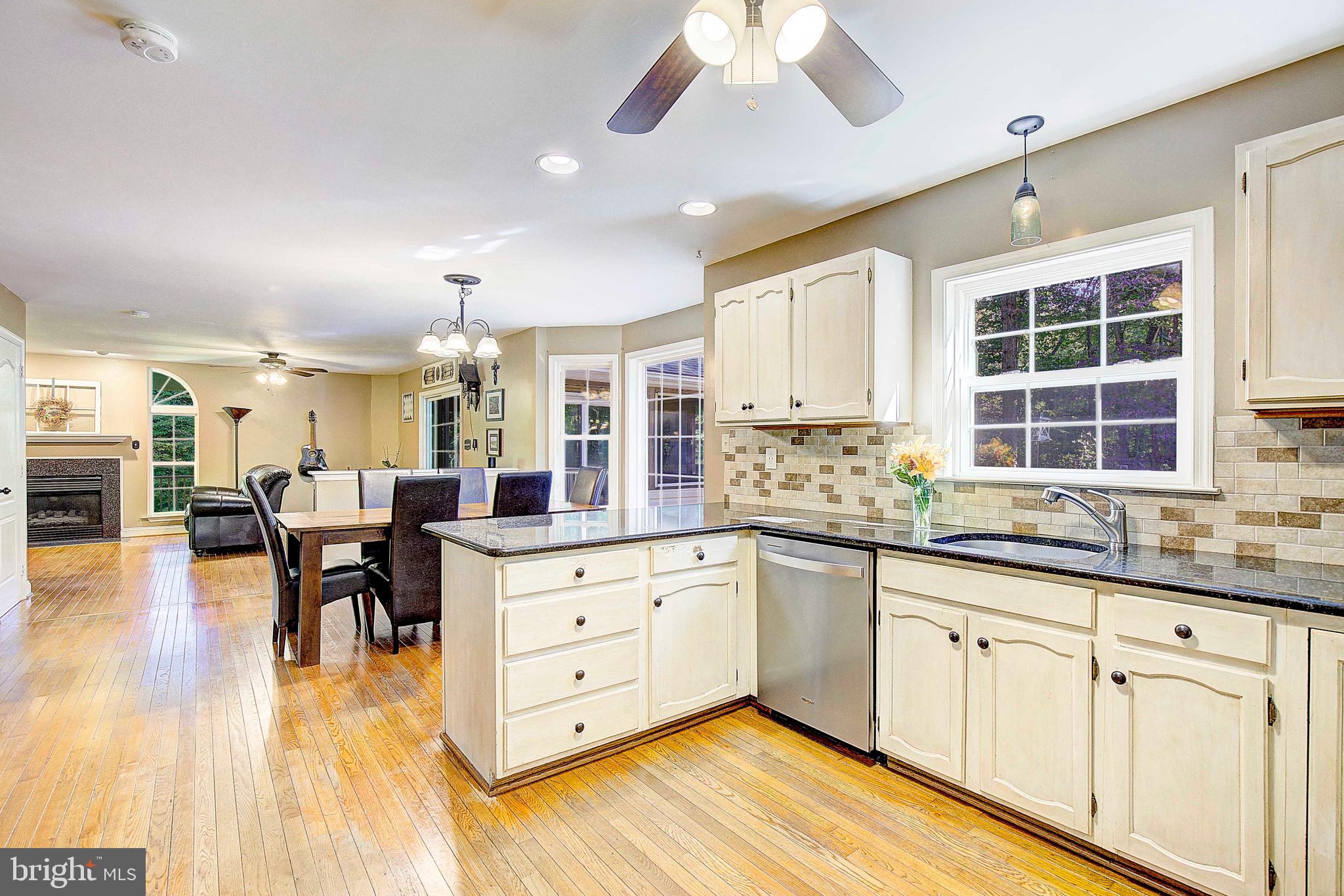 205 Walnut Creek Road Huntingtown, MD 20639 - Photo 20 of 48 a kitchen with counter space cabinets and appliances