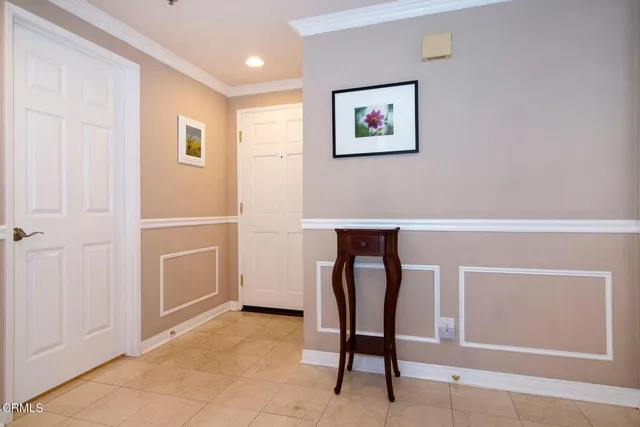 a view of cabinets with furniture and wooden floor