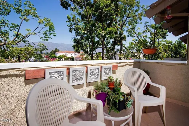 a view from deck having patio