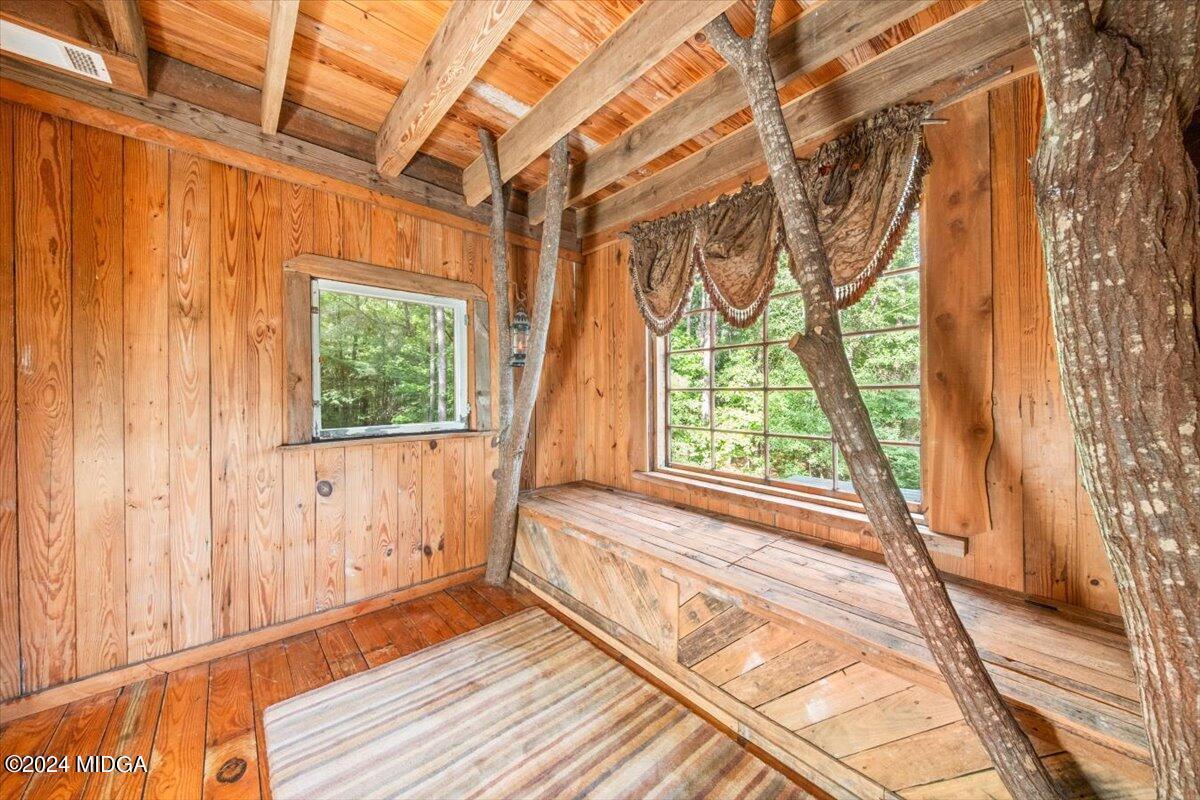 228 Pine Grove Church Road Culloden, GA 31016 - Photo 31 of 40 a view of a room with wooden floor and outer view