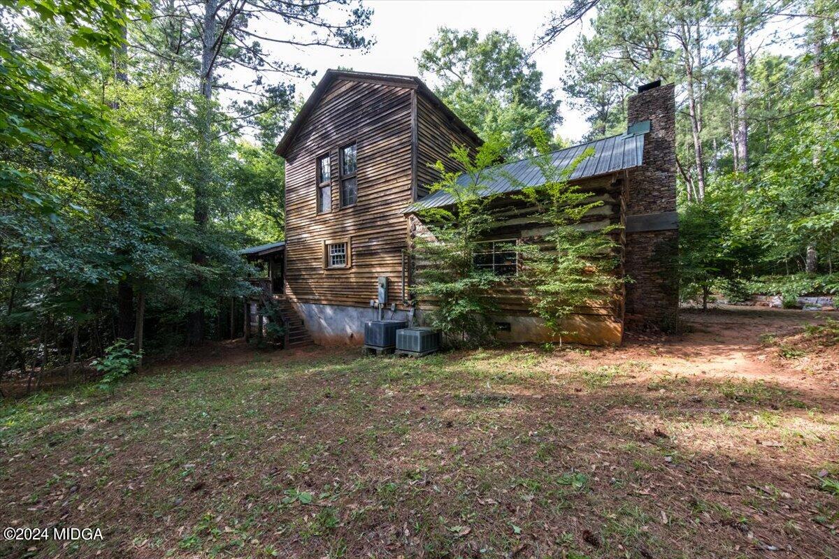 228 Pine Grove Church Road Culloden, GA 31016 - Photo 37 of 40 a view of a house with a tree