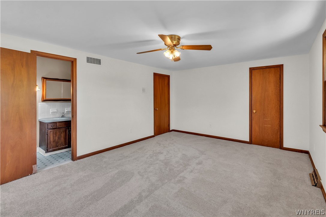 74 Heritage Road West Amherst, NY 14221 - Photo 21 of 42 Primary Bedroom