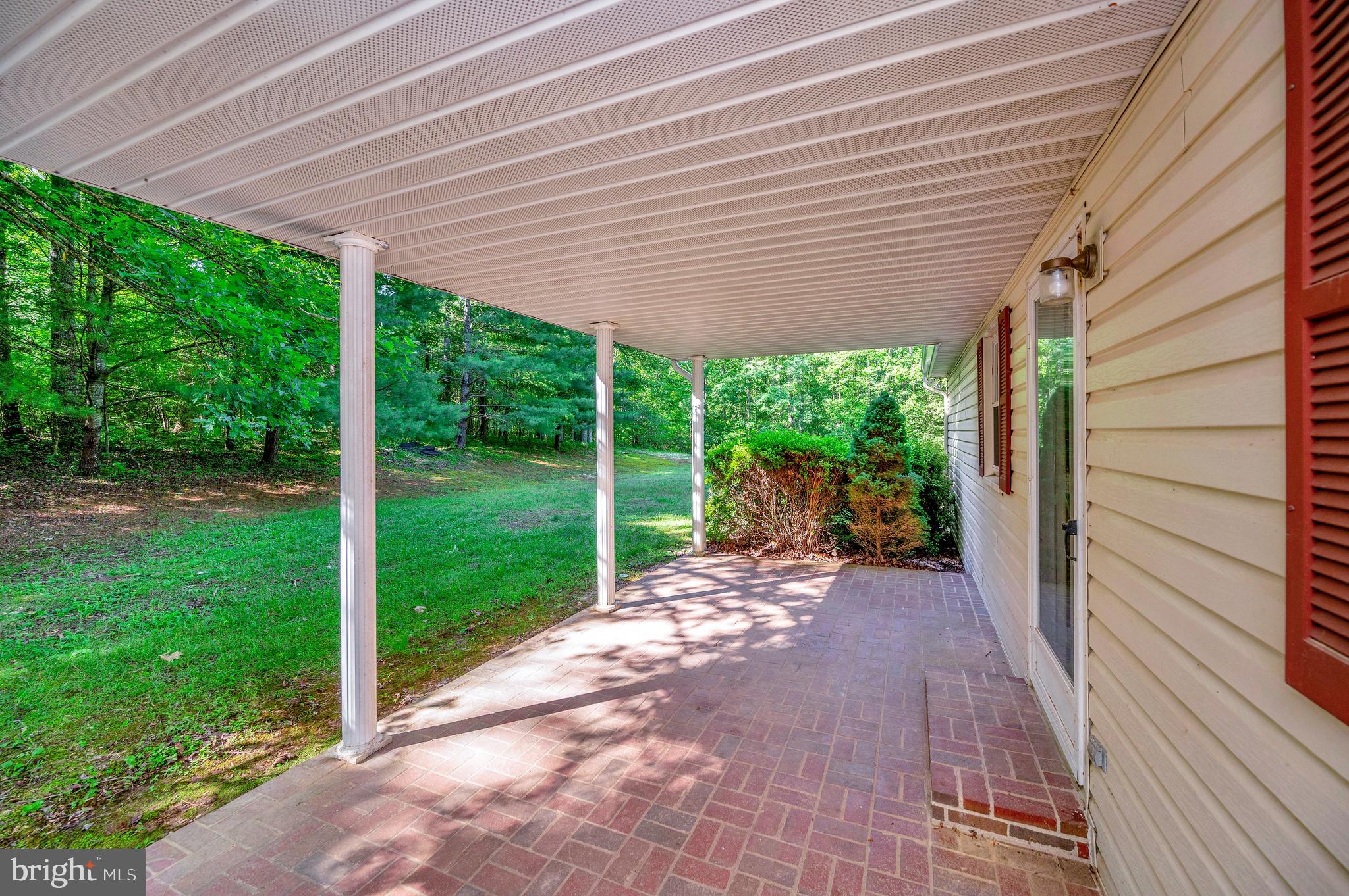 13824 Marsh Road Sumerduck, VA 22742 - Photo 7 of 33 Back Patio with Rear Entry