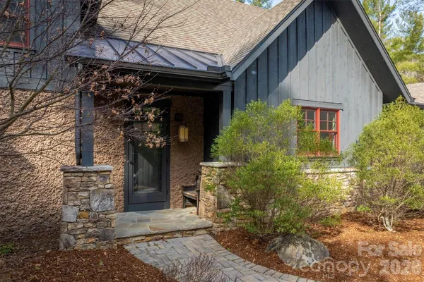 a view of room with walk in closet and bathroom