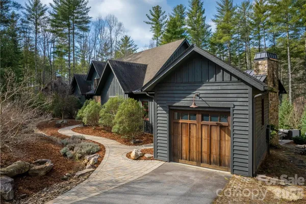 a house with trees in the background