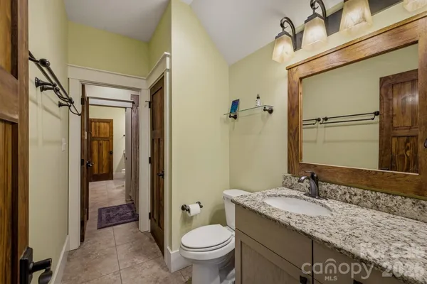 a bathroom with a tub and shower