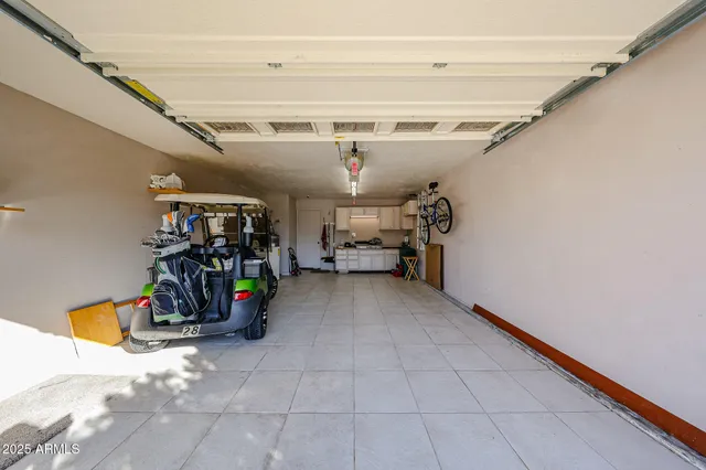 a view of a garage with rack and bicycle