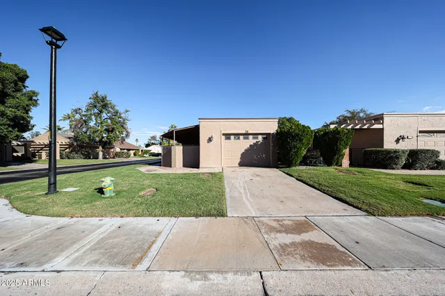a house view with a garden space
