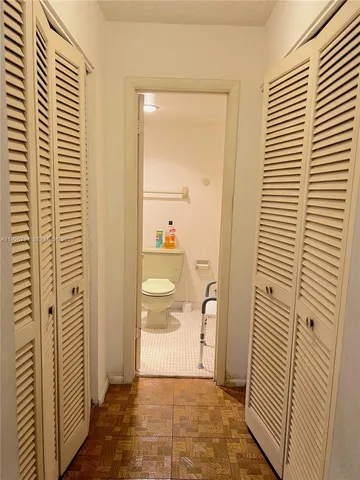 a view of a bathroom with a door