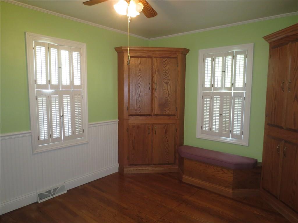 3926 Lamor Road Hermitage, PA 16148 - Photo 11 of 24 Bedroom #2 with corner built ins and storage seating.