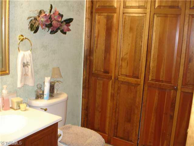2850 Slate Road King, NC 27021 - Photo 9 of 16 Laundry Room. Main level laundry with 1/2 bath
