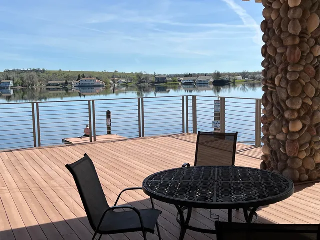 a view of house with trees in the background