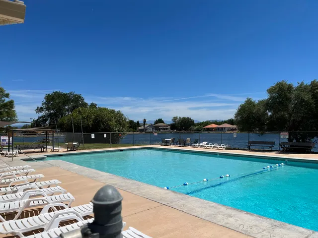 a view of a golf course with a lake