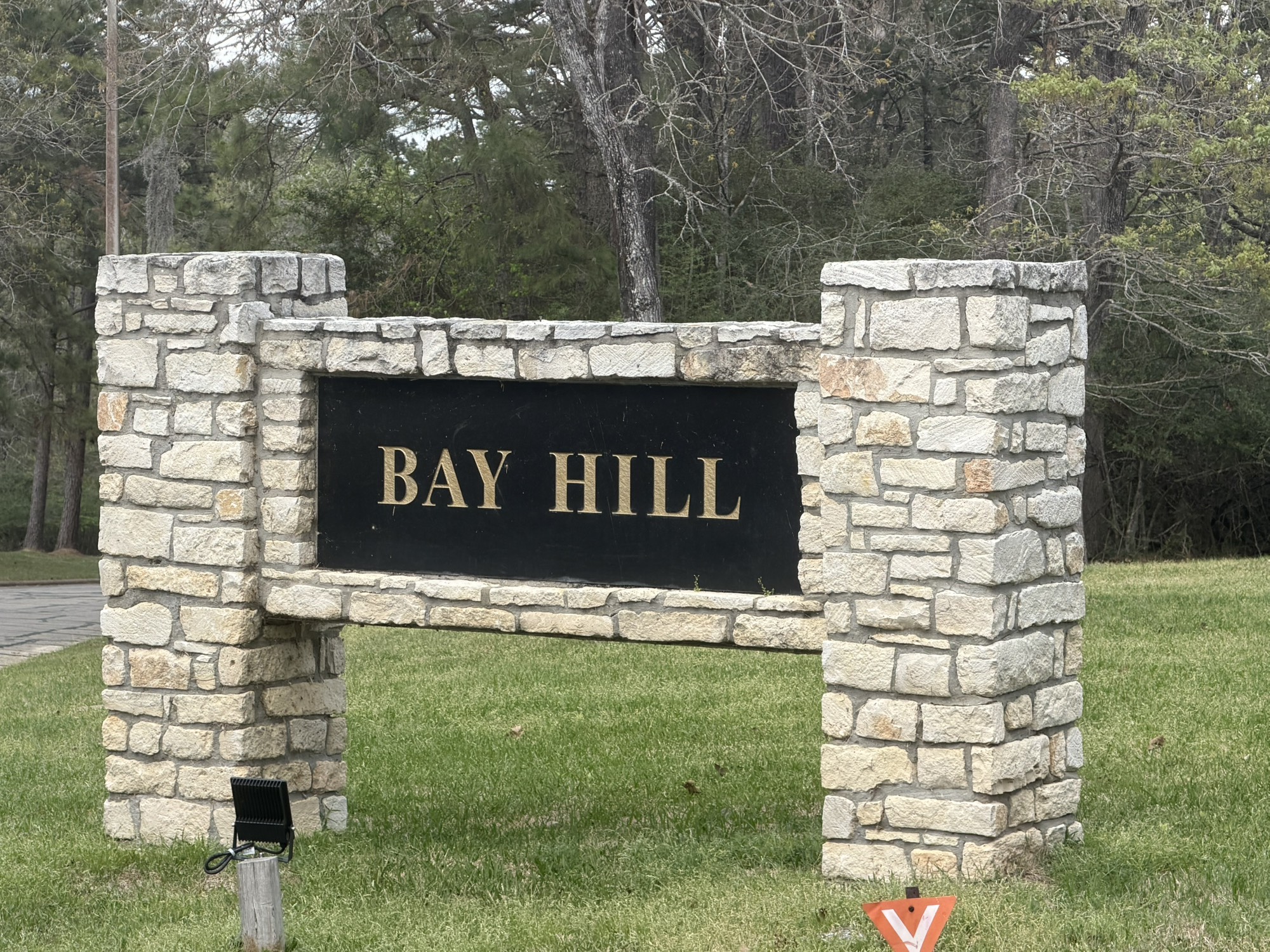 Tbd Bay Hill Road Point Blank, TX 77364 - Photo 9 of 9 a sign that is sitting in front of a house