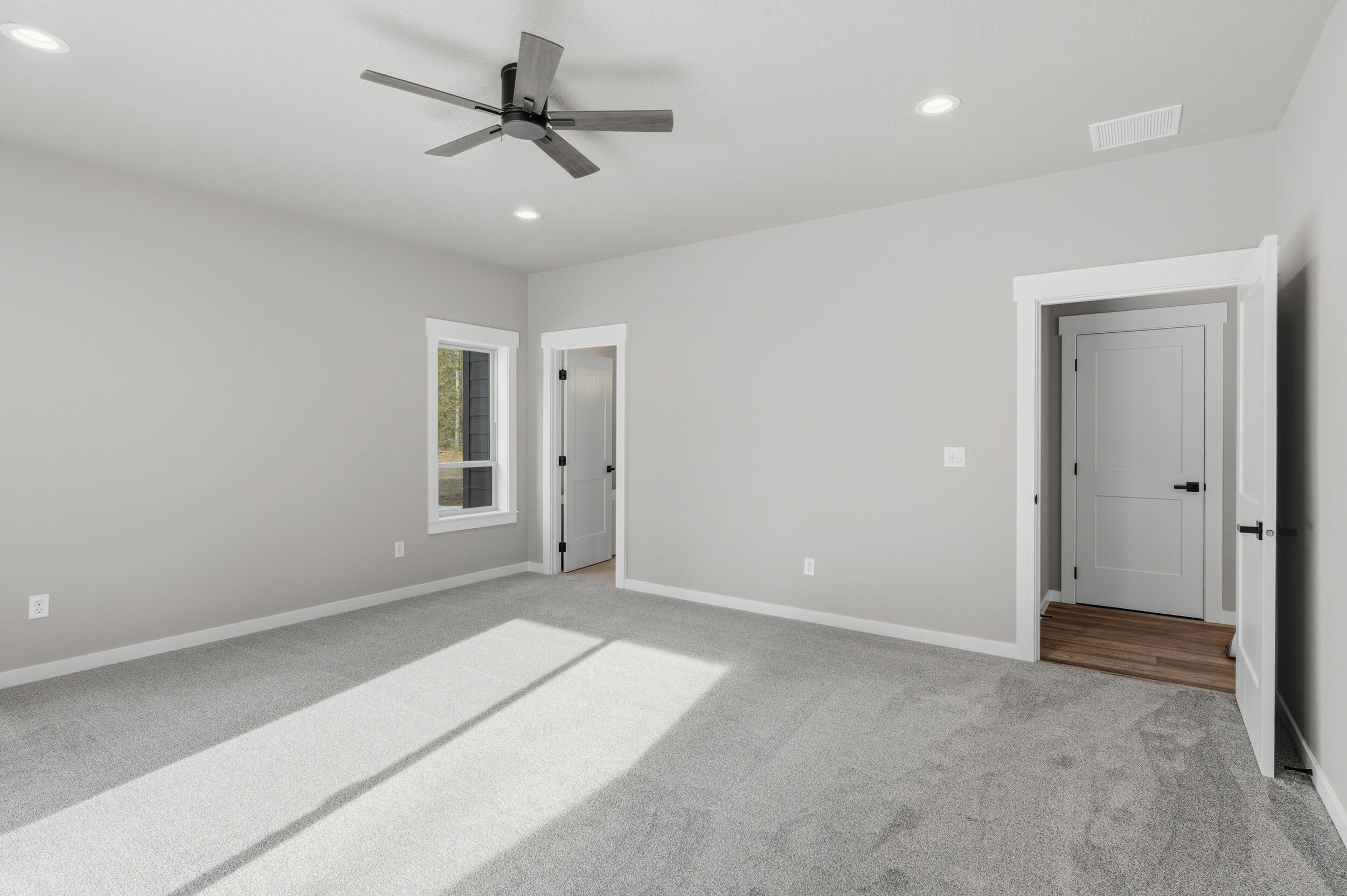 16083 Dyke Road, Unit 9 La Pine, OR 97739 - Photo 20 of 53 a view of a livingroom with a ceiling fan and window