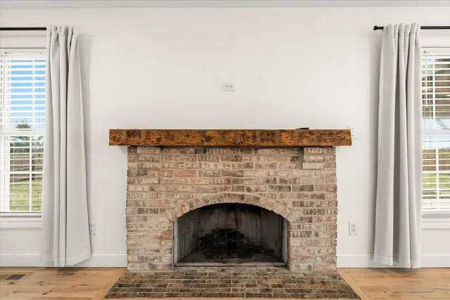 a living room with a fireplace in it