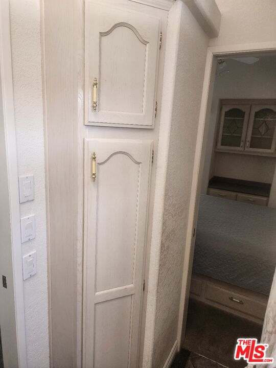 84136 Ave 44, Unit 306 Indio, CA 92203 - Photo 13 of 13 a bathroom with a mirror