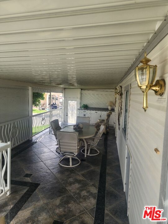 84136 Ave 44, Unit 306 Indio, CA 92203 - Photo 5 of 13 a dining room with furniture