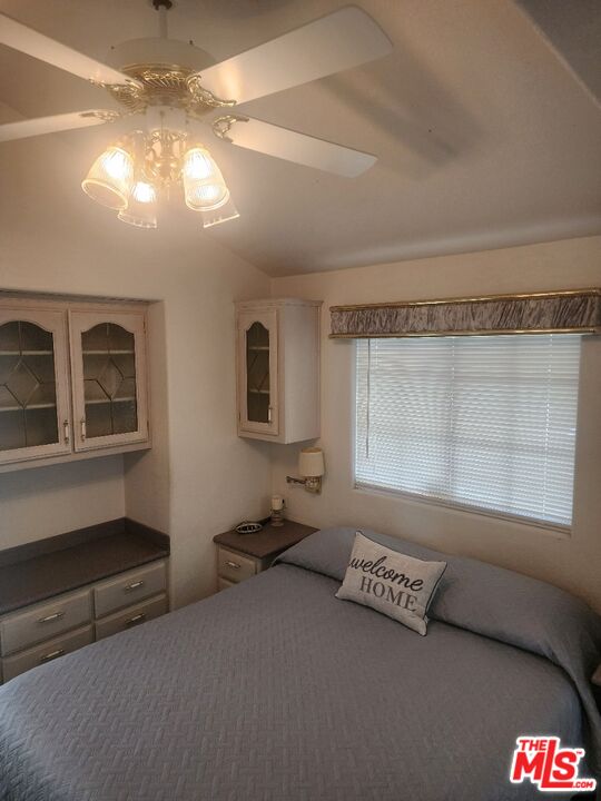 84136 Ave 44, Unit 306 Indio, CA 92203 - Photo 8 of 13 a living room with furniture and a window