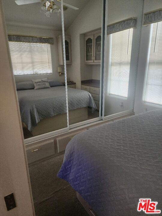 84136 Ave 44, Unit 306 Indio, CA 92203 - Photo 9 of 13 a bathroom with a shower and a sink