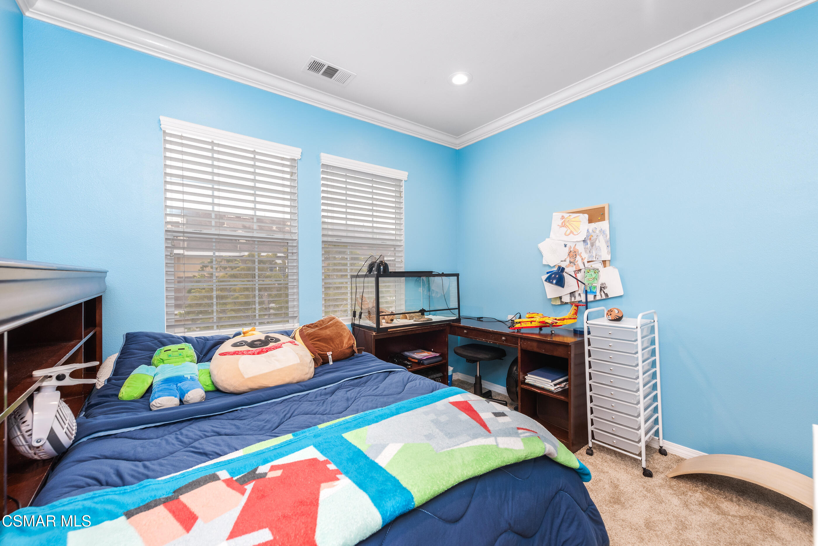 3116 North Oxnard Boulevard Oxnard, CA 93036 - Photo 23 of 46 a bedroom with a bed and a window