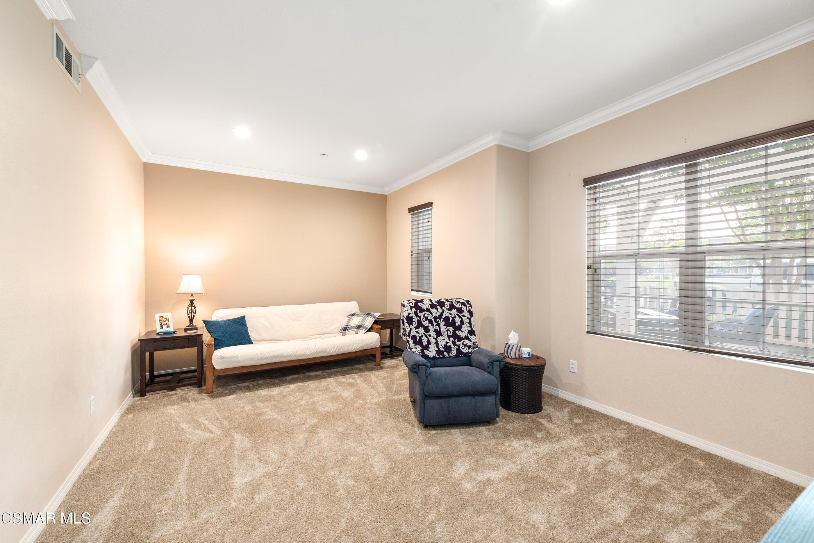 3116 North Oxnard Boulevard Oxnard, CA 93036 - Photo 8 of 46 a living room with furniture and a large window