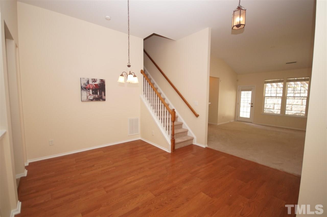8429 Header Stone Drive Raleigh, NC 27613 - Photo 2 of 19 a view of an entryway with staircase