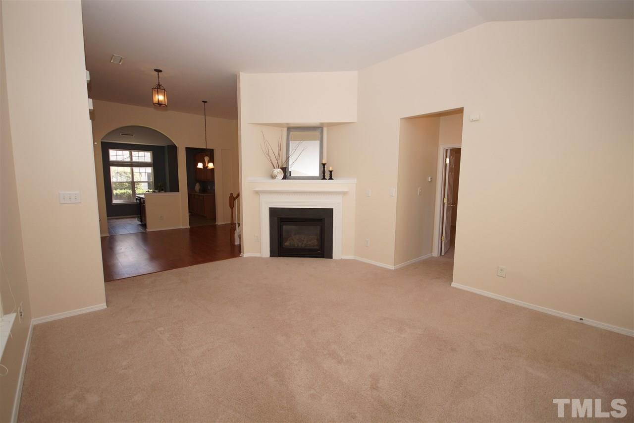 8429 Header Stone Drive Raleigh, NC 27613 - Photo 5 of 19 a view of a livingroom with a fireplace