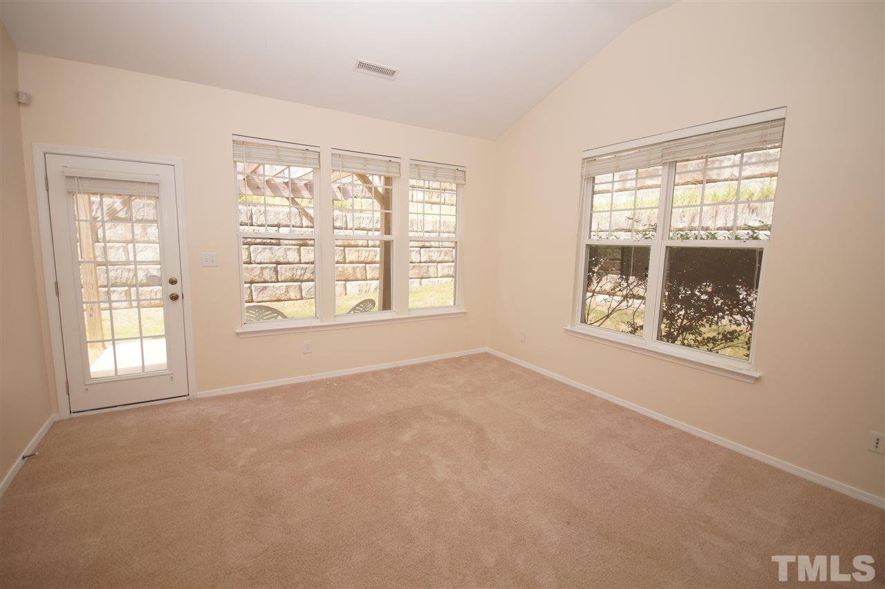 8429 Header Stone Drive Raleigh, NC 27613 - Photo 6 of 19 an empty room with windows and closet