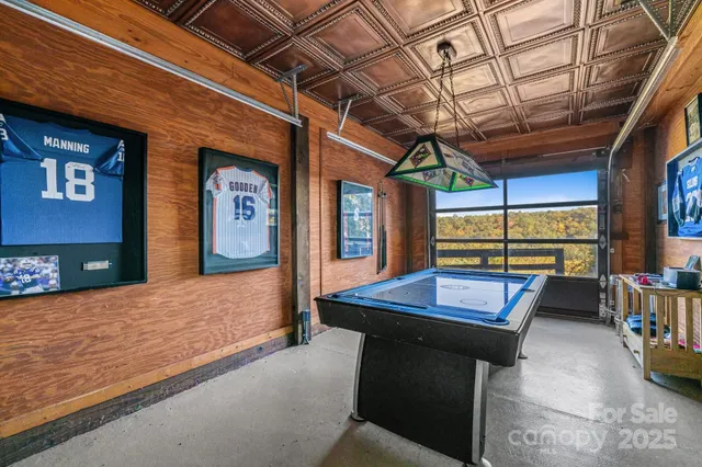 a utility room with furniture and a fireplace