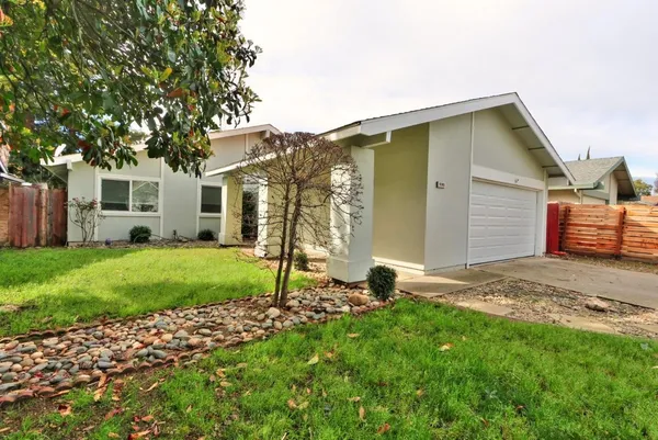 a front view of house with yard