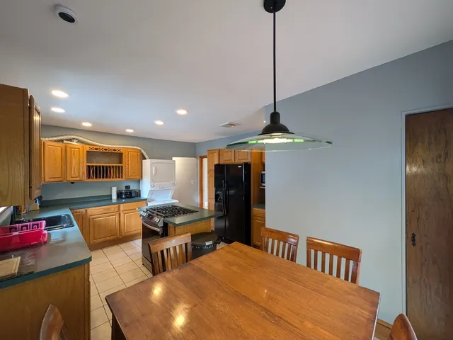a bedroom with furniture and a ceiling fan