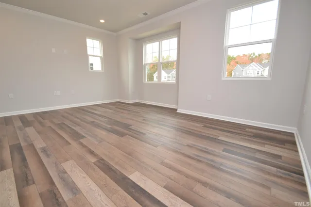 an empty room with windows