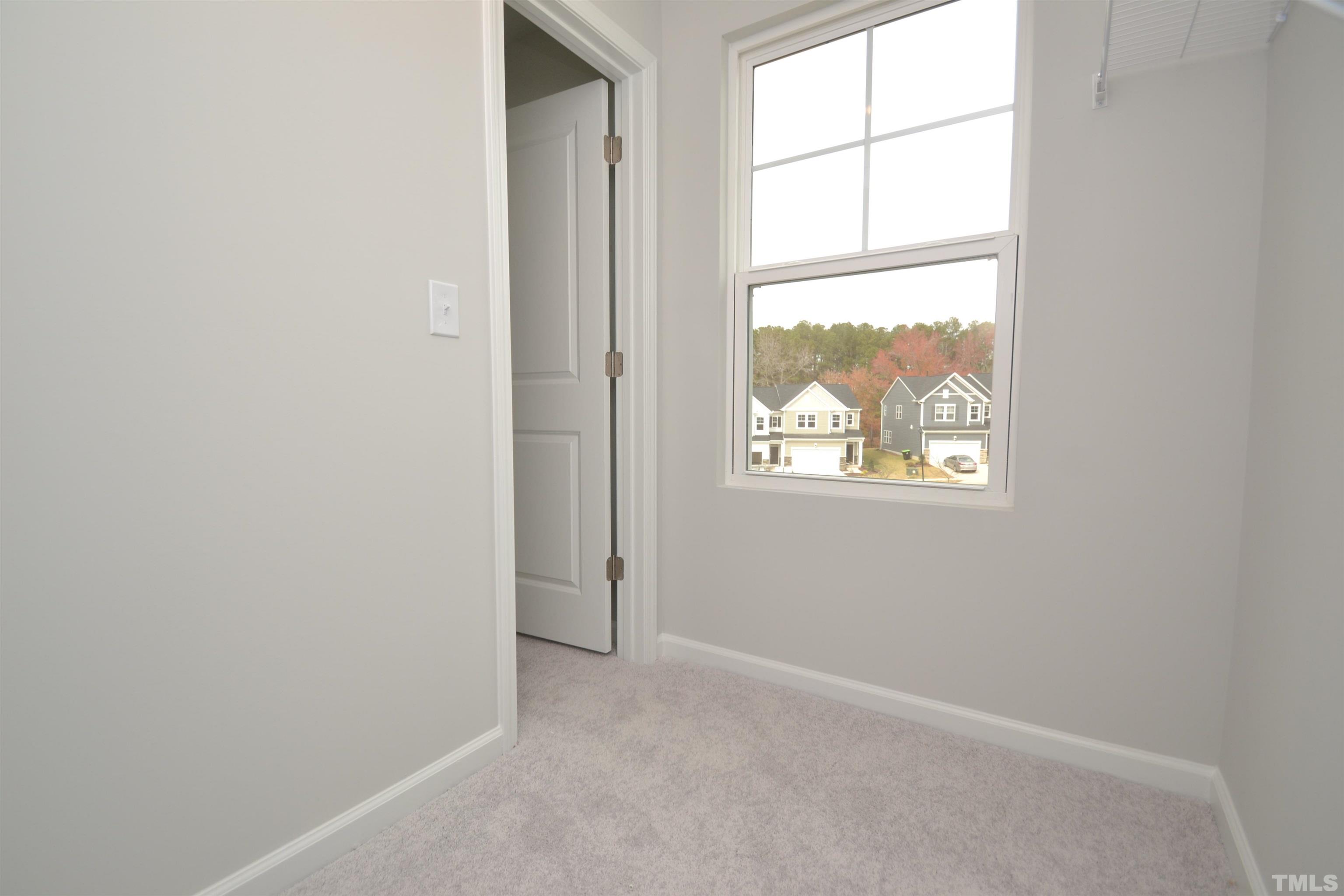 1837 Joscara Lane Apex, NC 27502 - Photo 31 of 45 an empty room with a window