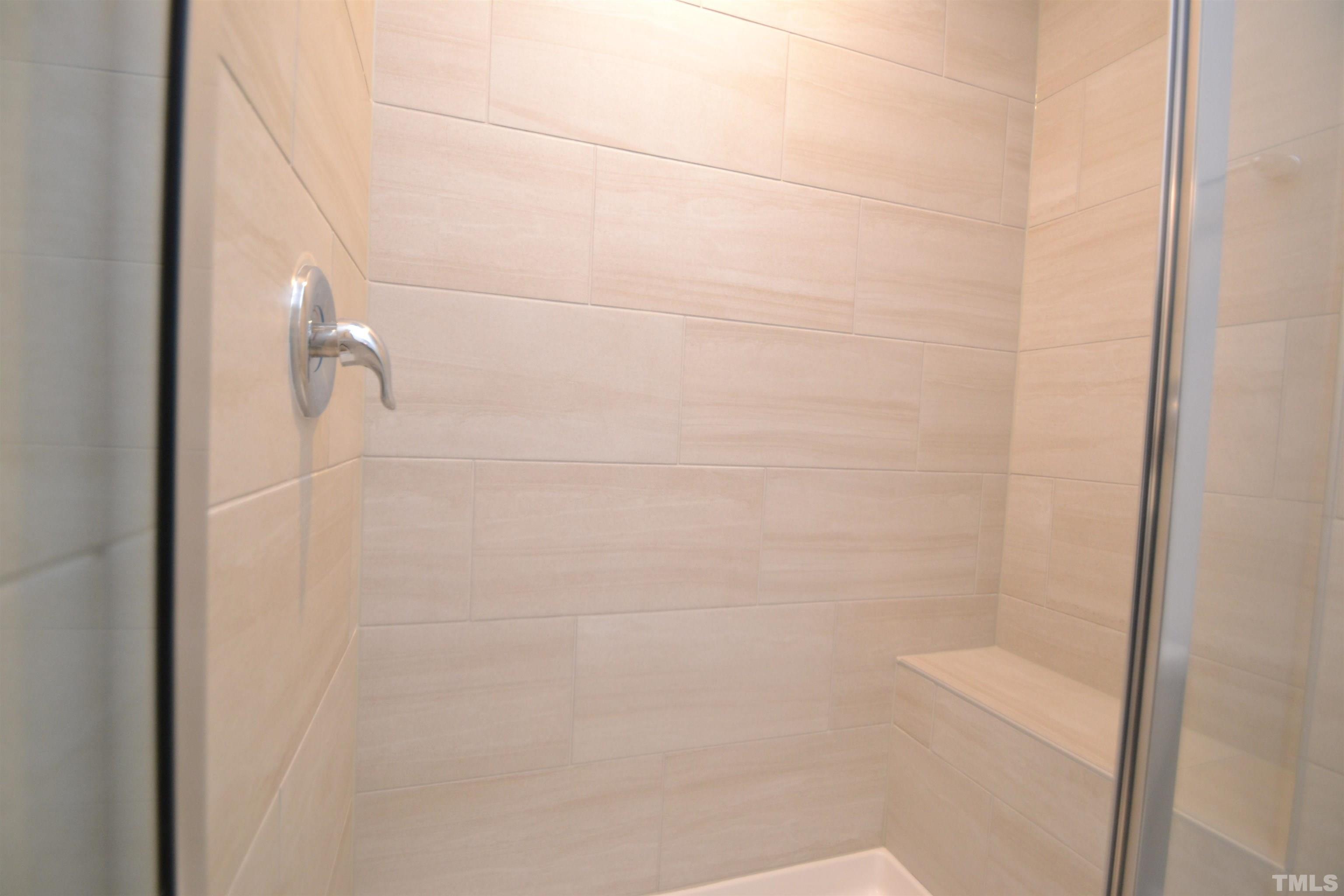 1837 Joscara Lane Apex, NC 27502 - Photo 39 of 45 a bathroom with a shower