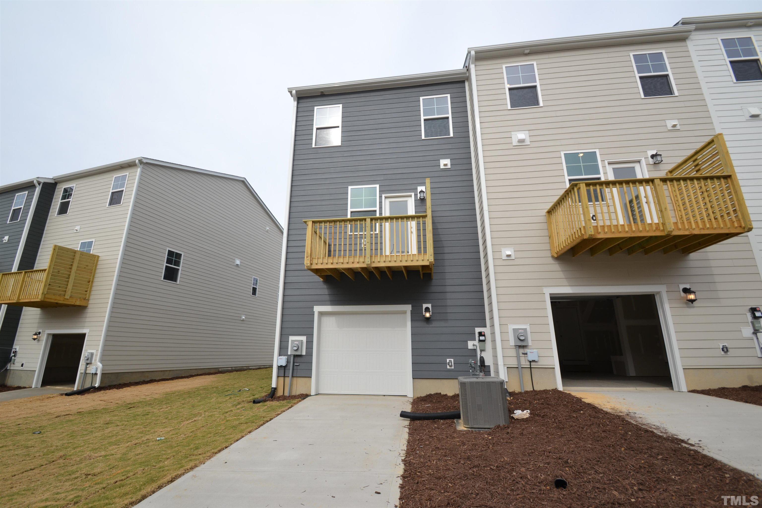 1837 Joscara Lane Apex, NC 27502 - Photo 45 of 45 a front view of a house with a garage