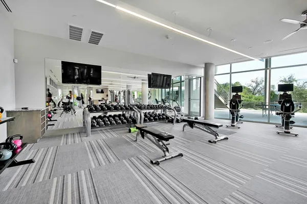 a room with lots of tables and chairs