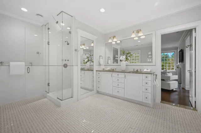 a spacious bathroom with a bathtub and toilet