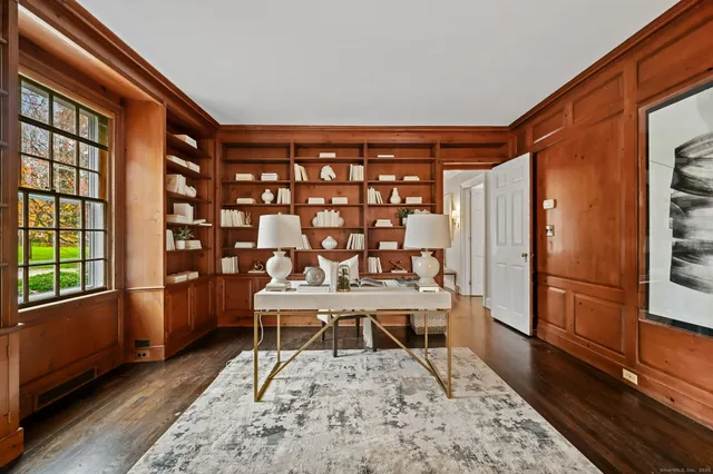 a living room with a couch and a table