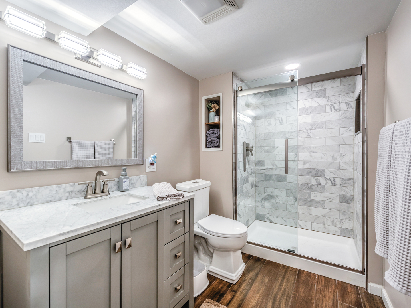 2005 West Spring Ridge Drive Arlington Heights, IL 60004 - Photo 16 of 24 a bathroom with a granite countertop sink toilet and shower