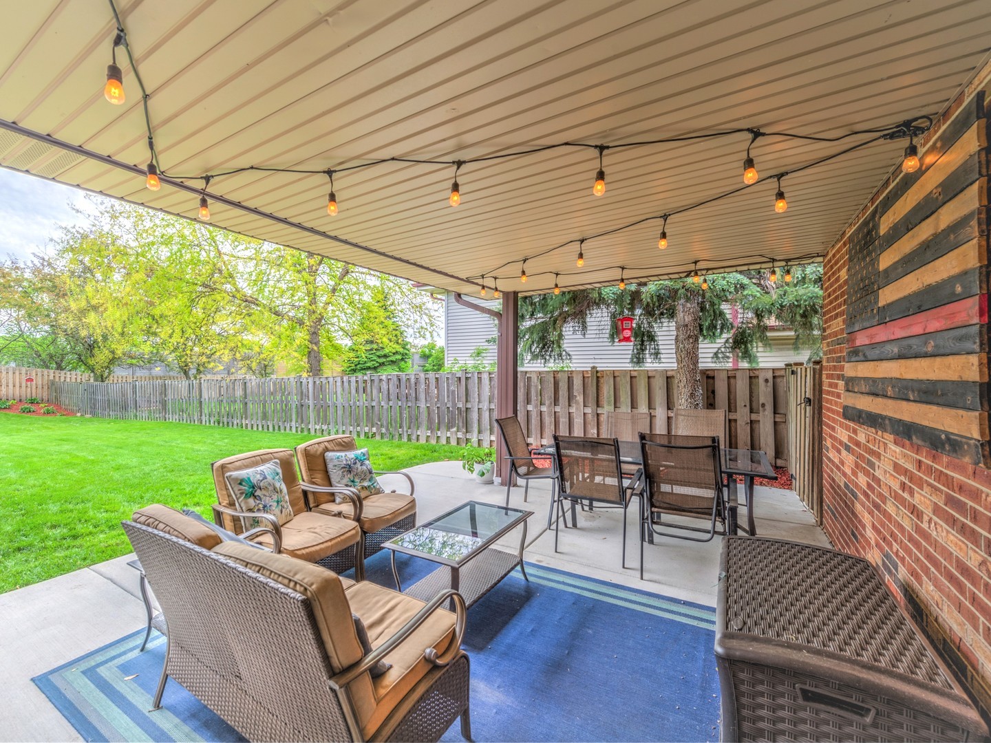 2005 West Spring Ridge Drive Arlington Heights, IL 60004 - Photo 22 of 24 a view of a patio with couches chairs and wooden floor