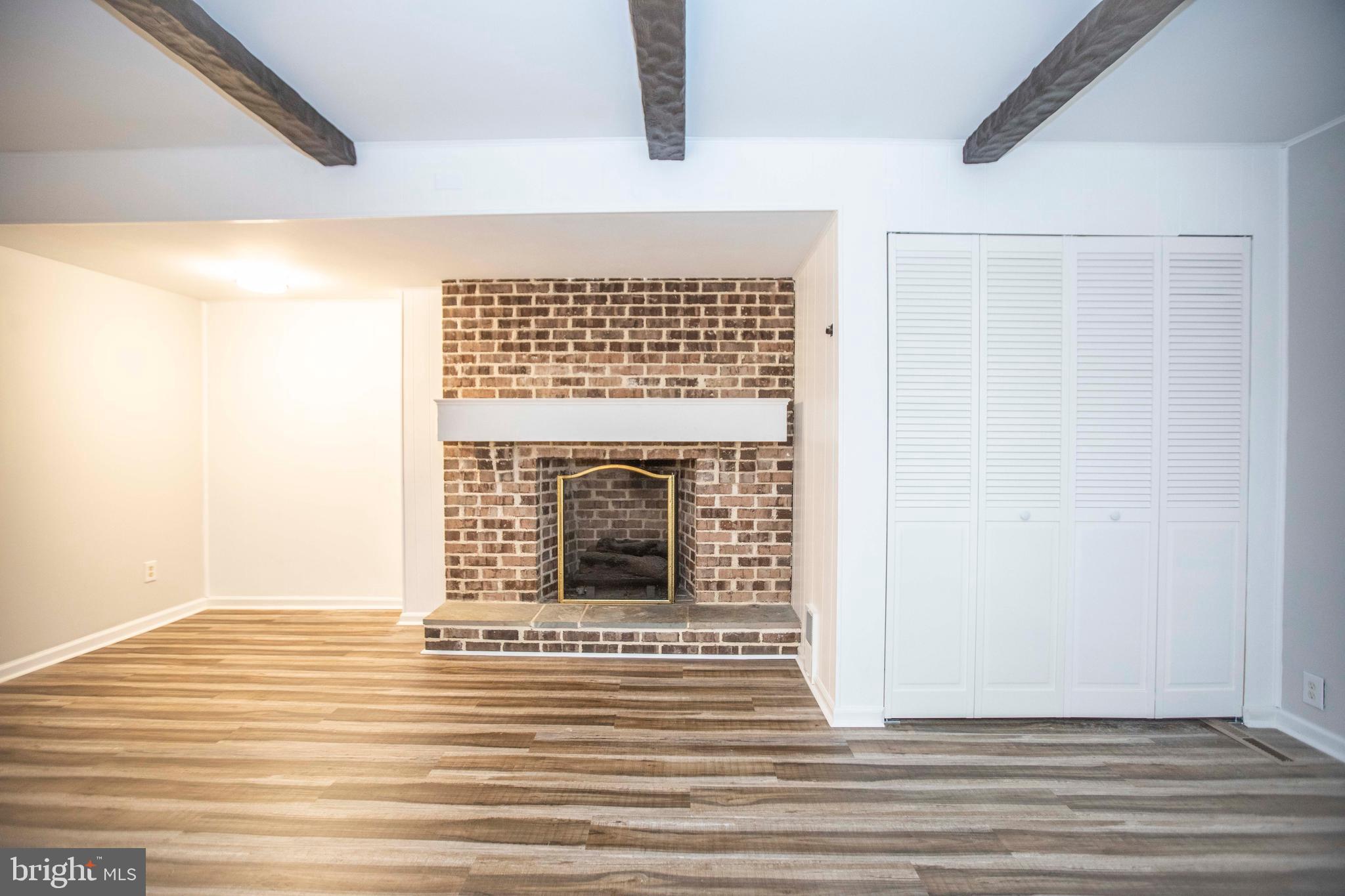 39 Tee Circle Reading, PA 19607 - Photo 27 of 33 Basement fireplace & large closet. Spacious area.