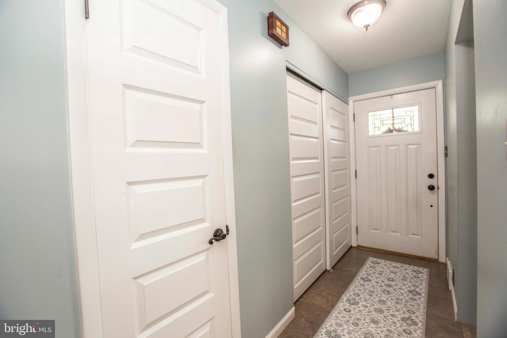 39 Tee Circle Reading, PA 19607 - Photo 4 of 33 Entrance walkway with closet and powder room.