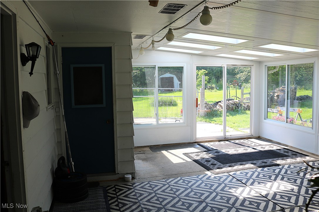 14485 Bass Lake Road Newbury, OH 44065 - Photo 18 of 22 View of unfurnished sunroom